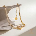 زاویه دیگر دستبند استیل ضدزنگ آبکاری طلای ۱۸ عیار برند J&D کد JDB2410029