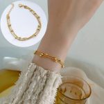 جزییات زنجیر و قفل دستبند زنجیری و مهره‌ای | دستبند چندتایی آبکاری طلای ۱۸ عیار طول 16 + 5 سانتی‌متر کد B202