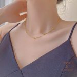 دستبند طرح دایره‌ای از استیل ضدزنگ با آبکاری طلای ۱۸ عیار برند مایا استون - تصویر 9