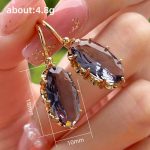 تصویر محصول گوشواره آبکاری طلای ۱۸ عیار نگین اتمی برند مایا استون کد MY0035