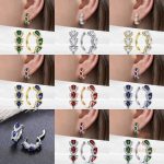نمای نزدیک گوشواره آویز آبکاری طلای ۱۸ عیار نگین اتمی برند مایا استون کد MY005